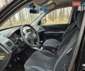 Черный Хендай Туксон, объемом двигателя 2 л и пробегом 198 тыс. км за 7800 $, фото 8 на Automoto.ua