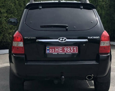 Чорний Хендай Туксон, об'ємом двигуна 2 л та пробігом 141 тис. км за 8200 $, фото 6 на Automoto.ua