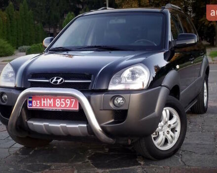 Черный Хендай Туксон, объемом двигателя 2 л и пробегом 230 тыс. км за 8600 $, фото 85 на Automoto.ua