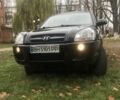 Черный Хендай Туксон, объемом двигателя 2 л и пробегом 210 тыс. км за 8999 $, фото 8 на Automoto.ua