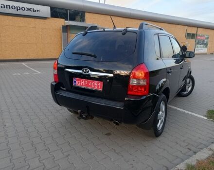 Черный Хендай Туксон, объемом двигателя 2 л и пробегом 192 тыс. км за 7950 $, фото 4 на Automoto.ua