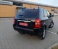 Черный Хендай Туксон, объемом двигателя 2 л и пробегом 192 тыс. км за 7950 $, фото 4 на Automoto.ua