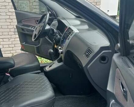 Чорний Хендай Туксон, об'ємом двигуна 2 л та пробігом 308 тис. км за 7555 $, фото 6 на Automoto.ua