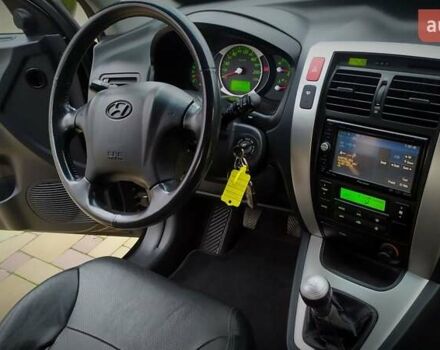 Чорний Хендай Туксон, об'ємом двигуна 2 л та пробігом 229 тис. км за 8600 $, фото 116 на Automoto.ua