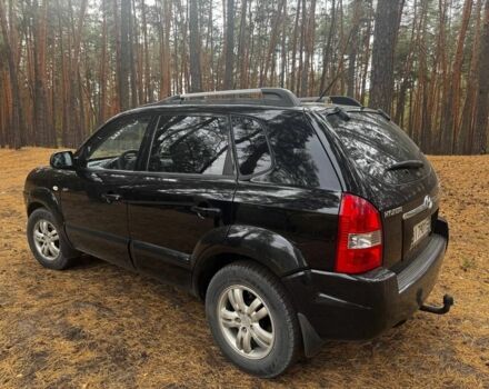 Черный Хендай Туксон, объемом двигателя 2 л и пробегом 240 тыс. км за 8800 $, фото 1 на Automoto.ua