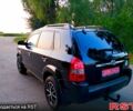 Чорний Хендай Туксон, об'ємом двигуна 2 л та пробігом 165 тис. км за 9900 $, фото 7 на Automoto.ua