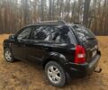 Черный Хендай Туксон, объемом двигателя 2 л и пробегом 240 тыс. км за 8800 $, фото 1 на Automoto.ua