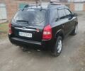 Чорний Хендай Туксон, об'ємом двигуна 2 л та пробігом 246 тис. км за 8100 $, фото 2 на Automoto.ua