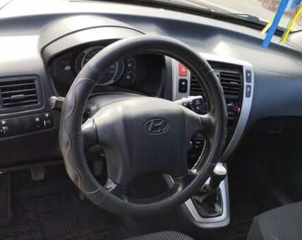 Черный Хендай Туксон, объемом двигателя 2 л и пробегом 270 тыс. км за 7500 $, фото 3 на Automoto.ua