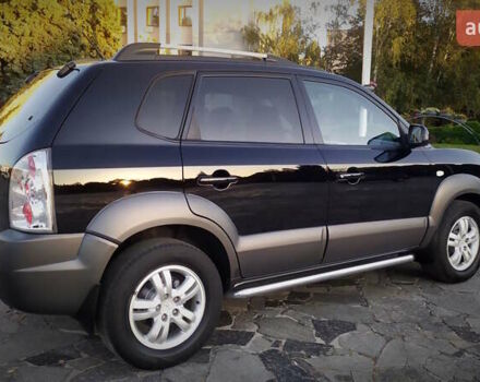 Черный Хендай Туксон, объемом двигателя 2 л и пробегом 230 тыс. км за 8600 $, фото 38 на Automoto.ua