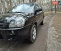 Черный Хендай Туксон, объемом двигателя 2 л и пробегом 198 тыс. км за 7800 $, фото 6 на Automoto.ua