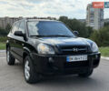 Черный Хендай Туксон, объемом двигателя 2 л и пробегом 300 тыс. км за 7350 $, фото 4 на Automoto.ua