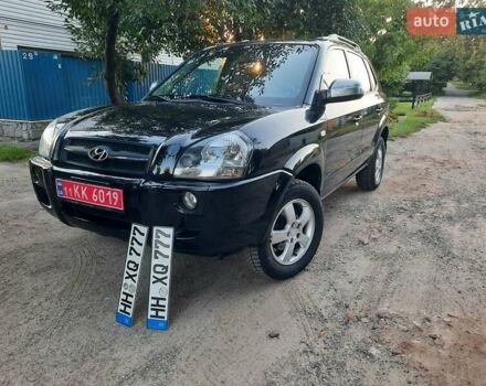 Черный Хендай Туксон, объемом двигателя 2 л и пробегом 219 тыс. км за 7990 $, фото 2 на Automoto.ua