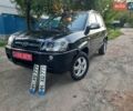 Черный Хендай Туксон, объемом двигателя 2 л и пробегом 219 тыс. км за 7990 $, фото 2 на Automoto.ua