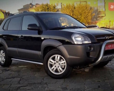 Черный Хендай Туксон, объемом двигателя 2 л и пробегом 230 тыс. км за 8600 $, фото 31 на Automoto.ua