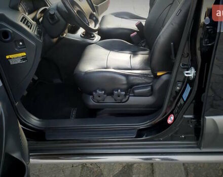 Черный Хендай Туксон, объемом двигателя 2 л и пробегом 230 тыс. км за 8600 $, фото 141 на Automoto.ua