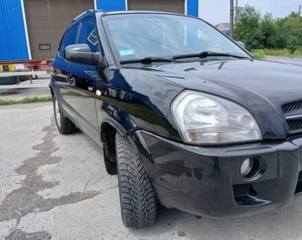 Чорний Хендай Туксон, об'ємом двигуна 2 л та пробігом 235 тис. км за 8000 $, фото 4 на Automoto.ua