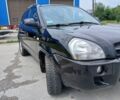Чорний Хендай Туксон, об'ємом двигуна 2 л та пробігом 235 тис. км за 8000 $, фото 4 на Automoto.ua