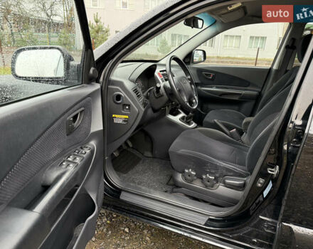 Чорний Хендай Туксон, об'ємом двигуна 2 л та пробігом 196 тис. км за 7250 $, фото 18 на Automoto.ua