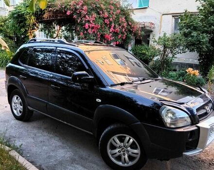 Черный Хендай Туксон, объемом двигателя 2 л и пробегом 270 тыс. км за 7400 $, фото 2 на Automoto.ua