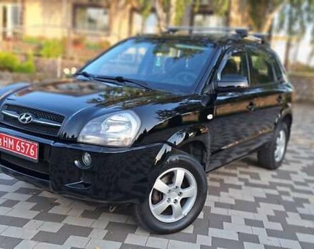 Черный Хендай Туксон, объемом двигателя 2 л и пробегом 190 тыс. км за 8150 $, фото 19 на Automoto.ua