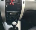 Черный Хендай Туксон, объемом двигателя 2 л и пробегом 240 тыс. км за 7900 $, фото 15 на Automoto.ua