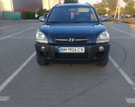 Черный Хендай Туксон, объемом двигателя 2 л и пробегом 289 тыс. км за 6600 $, фото 1 на Automoto.ua
