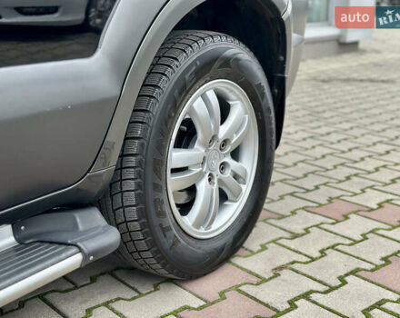 Чорний Хендай Туксон, об'ємом двигуна 2.66 л та пробігом 145 тис. км за 8900 $, фото 10 на Automoto.ua