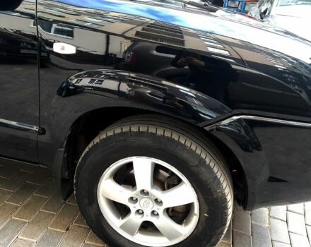 Чорний Хендай Туксон, об'ємом двигуна 2 л та пробігом 190 тис. км за 7500 $, фото 5 на Automoto.ua