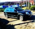 Черный Хендай Туксон, объемом двигателя 2 л и пробегом 218 тыс. км за 7700 $, фото 1 на Automoto.ua