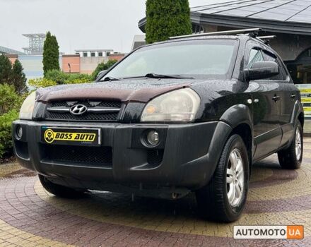 Черный Хендай Туксон, объемом двигателя 2 л и пробегом 201 тыс. км за 8600 $, фото 2 на Automoto.ua