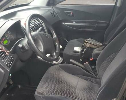 Чорний Хендай Туксон, об'ємом двигуна 1.98 л та пробігом 172 тис. км за 9300 $, фото 4 на Automoto.ua