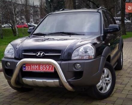Чорний Хендай Туксон, об'ємом двигуна 2 л та пробігом 229 тис. км за 8600 $, фото 1 на Automoto.ua