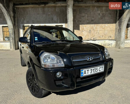 Черный Хендай Туксон, объемом двигателя 2 л и пробегом 189 тыс. км за 8250 $, фото 26 на Automoto.ua