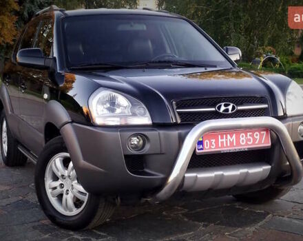 Черный Хендай Туксон, объемом двигателя 2 л и пробегом 230 тыс. км за 8600 $, фото 94 на Automoto.ua