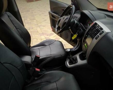 Чорний Хендай Туксон, об'ємом двигуна 2 л та пробігом 229 тис. км за 8600 $, фото 112 на Automoto.ua