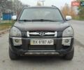 Черный Хендай Туксон, объемом двигателя 2 л и пробегом 270 тыс. км за 6800 $, фото 11 на Automoto.ua