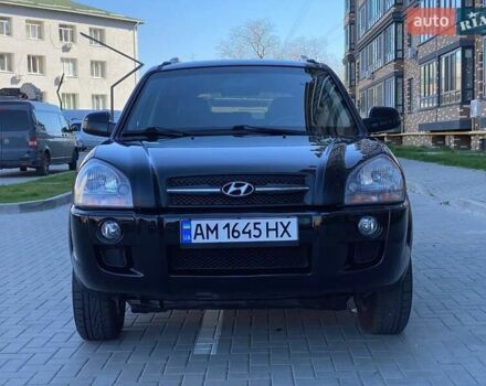 Черный Хендай Туксон, объемом двигателя 1.98 л и пробегом 286 тыс. км за 7300 $, фото 2 на Automoto.ua