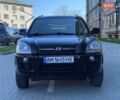 Черный Хендай Туксон, объемом двигателя 1.98 л и пробегом 286 тыс. км за 7300 $, фото 2 на Automoto.ua