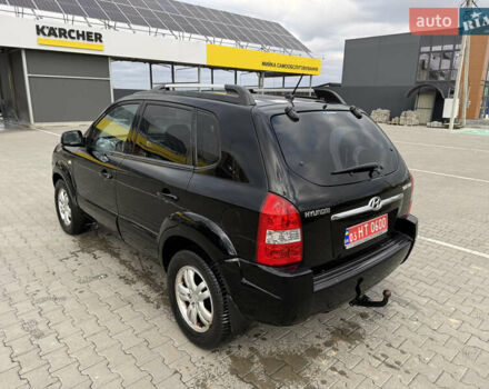 Черный Хендай Туксон, объемом двигателя 2 л и пробегом 182 тыс. км за 6999 $, фото 3 на Automoto.ua