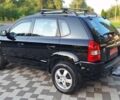Черный Хендай Туксон, объемом двигателя 2 л и пробегом 190 тыс. км за 8150 $, фото 12 на Automoto.ua