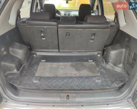 Черный Хендай Туксон, объемом двигателя 2 л и пробегом 270 тыс. км за 6800 $, фото 17 на Automoto.ua