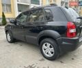 Черный Хендай Туксон, объемом двигателя 1.98 л и пробегом 147 тыс. км за 8000 $, фото 1 на Automoto.ua