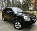 Черный Хендай Туксон, объемом двигателя 1.98 л и пробегом 99 тыс. км за 8999 $, фото 1 на Automoto.ua