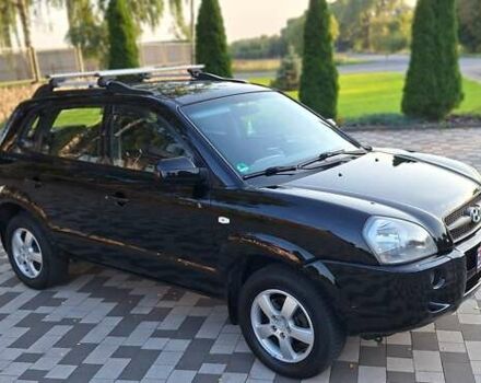 Черный Хендай Туксон, объемом двигателя 2 л и пробегом 190 тыс. км за 8150 $, фото 7 на Automoto.ua