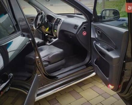 Чорний Хендай Туксон, об'ємом двигуна 2 л та пробігом 229 тис. км за 8600 $, фото 101 на Automoto.ua