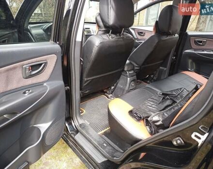 Черный Хендай Туксон, объемом двигателя 2 л и пробегом 240 тыс. км за 8200 $, фото 4 на Automoto.ua