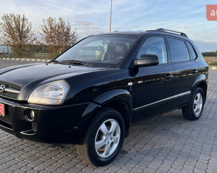 Черный Хендай Туксон, объемом двигателя 1.98 л и пробегом 243 тыс. км за 8500 $, фото 36 на Automoto.ua