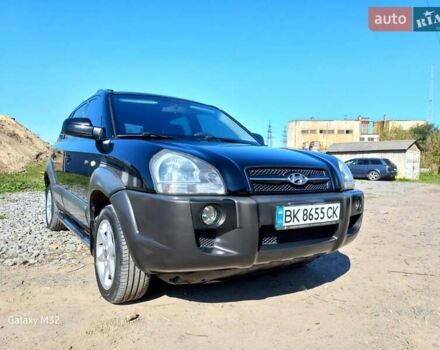 Черный Хендай Туксон, объемом двигателя 2 л и пробегом 219 тыс. км за 8500 $, фото 7 на Automoto.ua