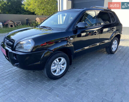 Черный Хендай Туксон, объемом двигателя 1.98 л и пробегом 197 тыс. км за 8000 $, фото 2 на Automoto.ua